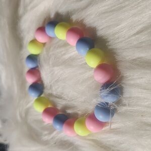 Handcrafted beaded bracelet made on a stretchy cord